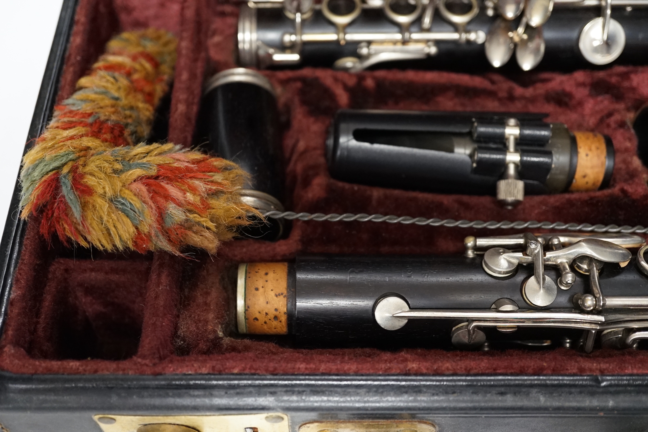 A cased Boosey & Hawkes 4-20 clarinet, in a fine original fitted leather case